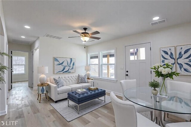 15608 E 267th St, Harrisonville, MO 64701 - living room featuring light wood finished floors, a ceiling fan, baseboards, and recessed lighting