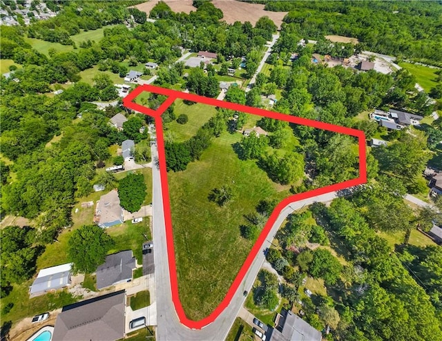 1717 NE Luther Rd, Lees Summit, MO 64086 - aerial view of property's location with property parcel outlined and nearby suburban area