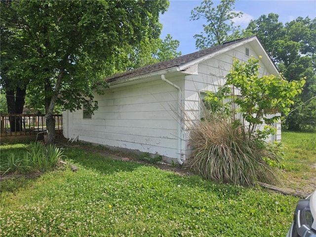 201 2nd St, Uniontown, KS 66779 - view of home's exterior with a yard and a wooden deck
