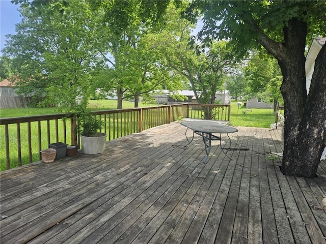 201 2nd St, Uniontown, KS 66779 - wooden terrace featuring a yard