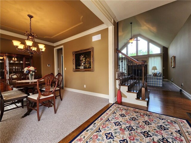 14650 NW 66th Ter, Parkville, MO 64152 - dining space with baseboards, wood finished floors, a chandelier, stairway, and ceiling fan
