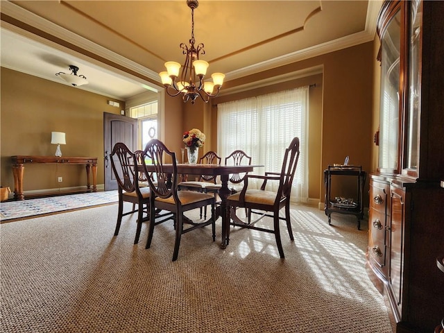 14650 NW 66th Ter, Parkville, MO 64152 - dining space featuring crown molding, carpet flooring, baseboards, a chandelier, and a raised ceiling