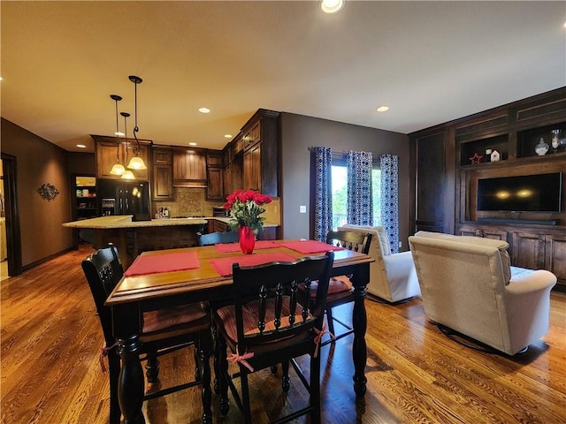 14650 NW 66th Ter, Parkville, MO 64152 - dining area featuring dark wood-style flooring and recessed lighting