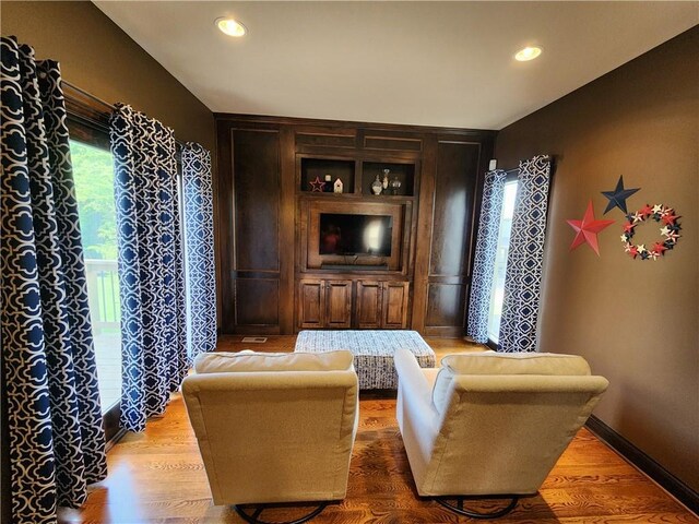 14650 NW 66th Ter, Parkville, MO 64152 - living room with recessed lighting, wood finished floors, and baseboards