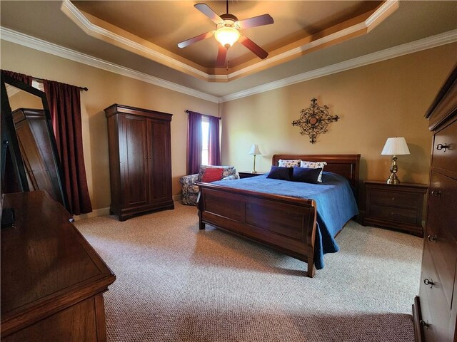 14650 NW 66th Ter, Parkville, MO 64152 - bedroom with a tray ceiling, light colored carpet, ornamental molding, and ceiling fan