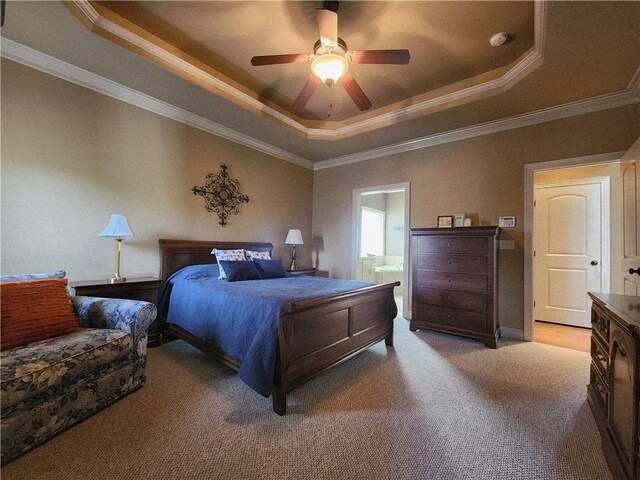 14650 NW 66th Ter, Parkville, MO 64152 - carpeted bedroom with a raised ceiling, ornamental molding, a ceiling fan, and ensuite bath