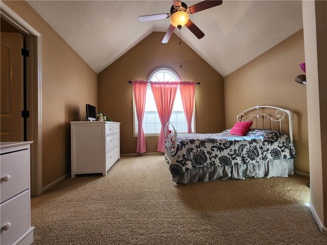 14650 NW 66th Ter, Parkville, MO 64152 - bedroom with carpet floors, vaulted ceiling, a ceiling fan, and a textured ceiling