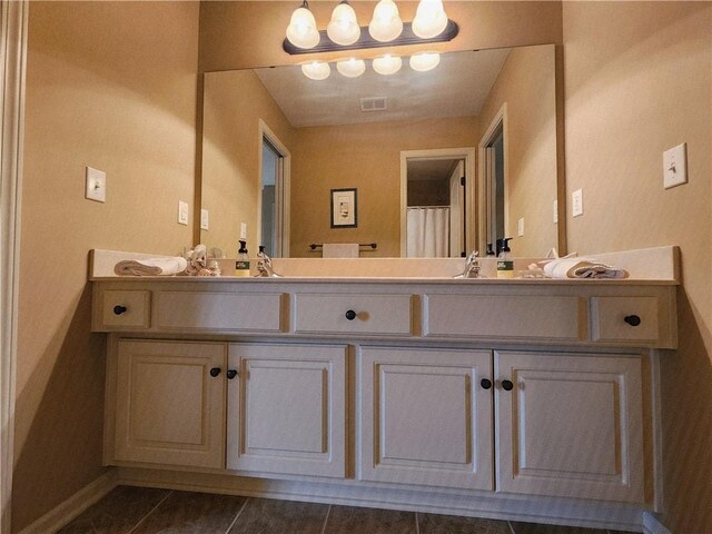14650 NW 66th Ter, Parkville, MO 64152 - full bathroom featuring double vanity and baseboards