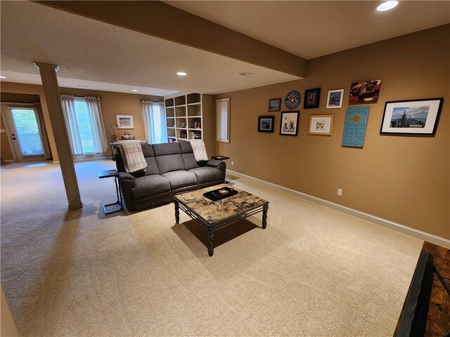 14650 NW 66th Ter, Parkville, MO 64152 - living area with carpet, baseboards, recessed lighting, and ornate columns