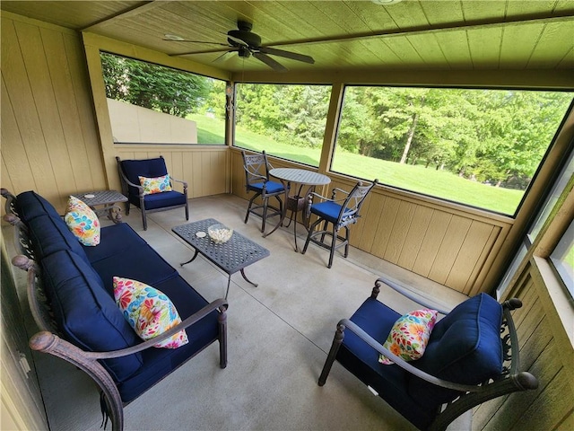 14650 NW 66th Ter, Parkville, MO 64152 - sunroom featuring a ceiling fan, plenty of natural light, and an outdoor living space