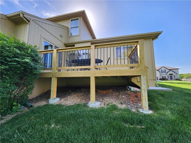 14650 NW 66th Ter, Parkville, MO 64152 - rear view of property with a yard and a deck