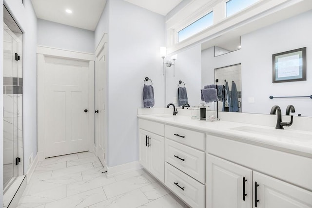 4403 Goldfield St, Lawrence, KS 66049 - bathroom with marble look tiles, double vanity, a stall shower, and baseboards