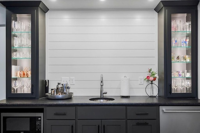 4403 Goldfield St, Lawrence, KS 66049 - indoor wet bar featuring appliances with stainless steel finishes