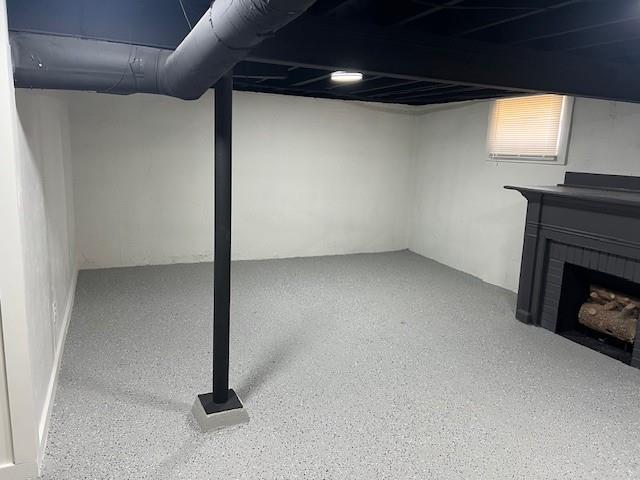 basement featuring a fireplace