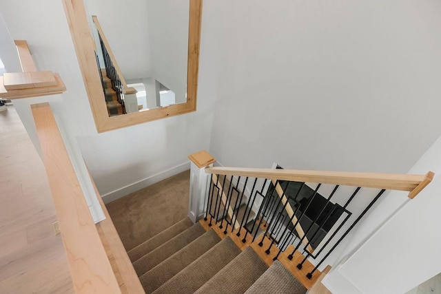 stairs featuring baseboards
