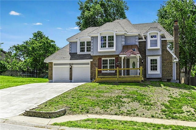 16253 W Briarwood Ct, Olathe, KS 66062 - view of front of property with driveway, stucco siding, an attached garage, and roof with shingles