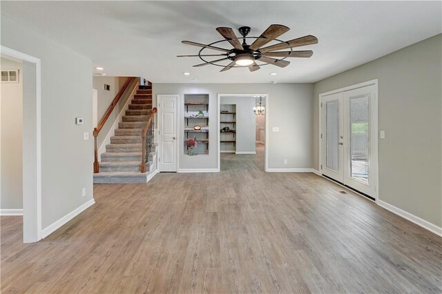 16253 W Briarwood Ct, Olathe, KS 66062 - unfurnished living room with a ceiling fan, stairs, light wood finished floors, baseboards, and recessed lighting