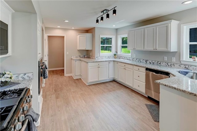 16253 W Briarwood Ct, Olathe, KS 66062 - kitchen featuring stainless steel appliances, light wood-style floors, light stone countertops, white cabinetry, and track lighting