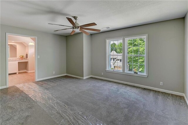 16253 W Briarwood Ct, Olathe, KS 66062 - carpeted spare room with ceiling fan and baseboards