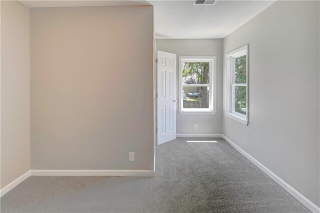 16253 W Briarwood Ct, Olathe, KS 66062 - carpeted empty room with baseboards