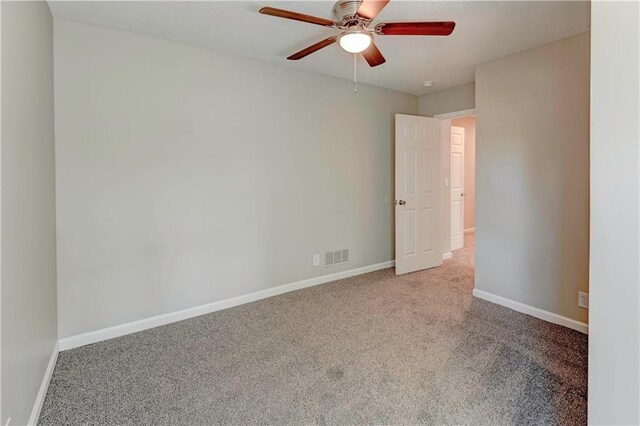 16253 W Briarwood Ct, Olathe, KS 66062 - spare room featuring ceiling fan, carpet flooring, and baseboards