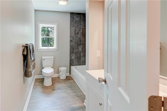 16253 W Briarwood Ct, Olathe, KS 66062 - full bath featuring toilet, wood finished floors, baseboards, and vanity