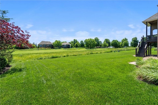 10233 N Prospect Ave, Kansas City, MO 64155 - view of grassy yard with stairway
