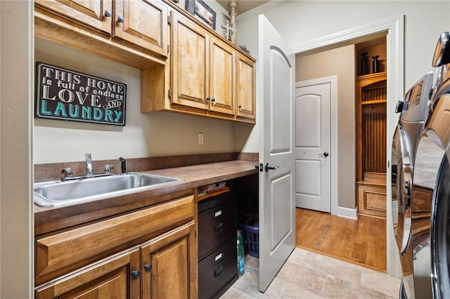10233 N Prospect Ave, Kansas City, MO 64155 - washroom with cabinet space and washer and clothes dryer