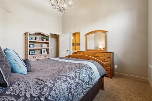 10233 N Prospect Ave, Kansas City, MO 64155 - carpeted bedroom with a chandelier, a high ceiling, and baseboards