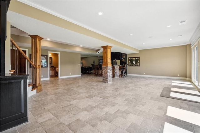 10233 N Prospect Ave, Kansas City, MO 64155 - unfurnished living room featuring ornate columns, baseboards, stairway, recessed lighting, and crown molding