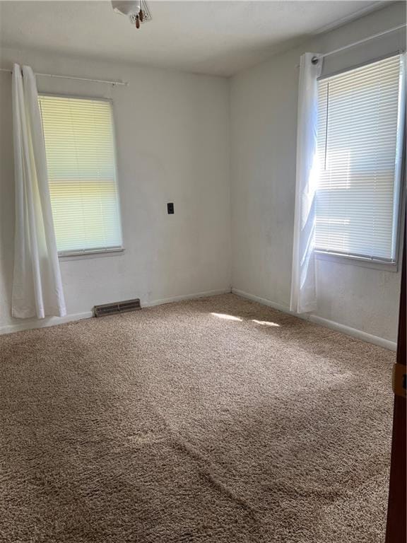 5720 NW 51st St, Kansas City, MO 64151 - unfurnished room featuring carpet flooring and baseboards