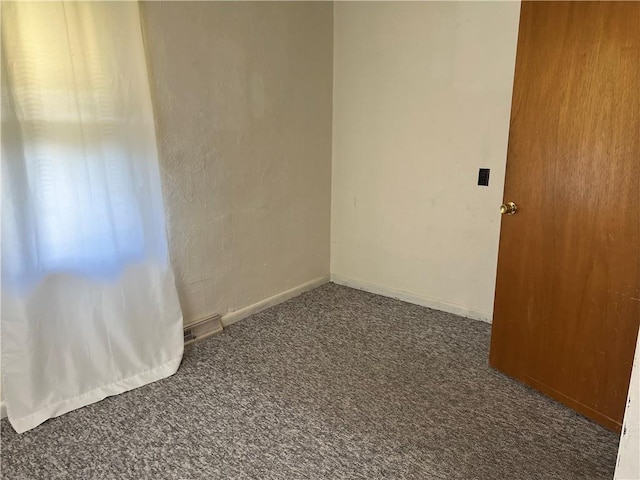 5720 NW 51st St, Kansas City, MO 64151 - spare room with carpet floors and baseboards