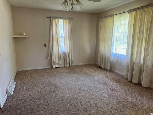 5720 NW 51st St, Kansas City, MO 64151 - carpeted spare room with ceiling fan and baseboards