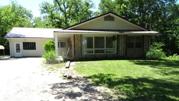 6780 SW County Road 2007th Rd, Rich Hill, MO 64779 - view of front of home featuring a front lawn and driveway
