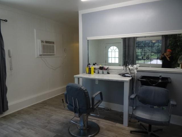 6780 SW County Road 2007th Rd, Rich Hill, MO 64779 - office space featuring wood finished floors, a wall mounted AC, and baseboards