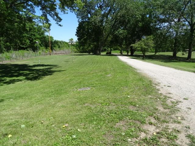 6780 SW County Road 2007th Rd, Rich Hill, MO 64779 - view of community featuring a yard