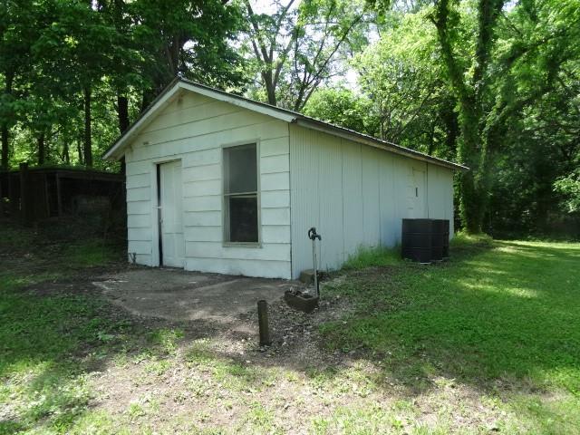 6780 SW County Road 2007th Rd, Rich Hill, MO 64779 - view of outbuilding with central AC unit