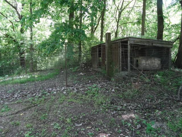 6780 SW County Road 2007th Rd, Rich Hill, MO 64779 - view of yard featuring an outbuilding and exterior structure