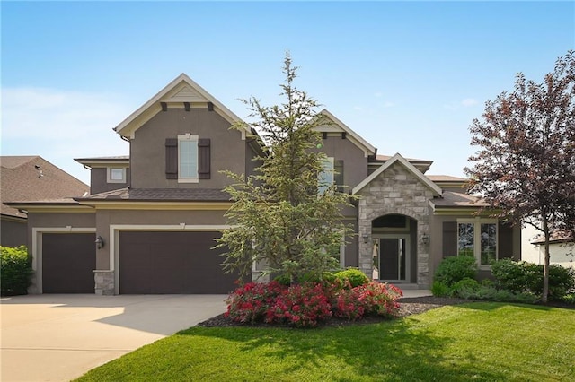15601 Windsor St, Overland Park, KS 66224 - view of front facade with stone siding, stucco siding, a front yard, and driveway