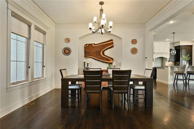 15601 Windsor St, Overland Park, KS 66224 - dining space featuring a chandelier, dark wood-type flooring, crown molding, baseboards, and recessed lighting
