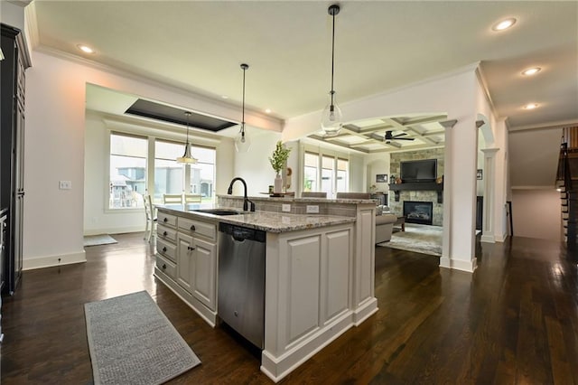 15601 Windsor St, Overland Park, KS 66224 - kitchen featuring stainless steel dishwasher, a ceiling fan, a sink, coffered ceiling, and a stone fireplace