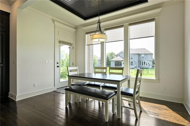 15601 Windsor St, Overland Park, KS 66224 - dining space with healthy amount of natural light, baseboards, dark wood-style flooring, and ornamental molding