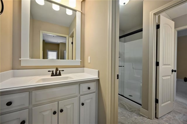 15601 Windsor St, Overland Park, KS 66224 - bathroom with a stall shower, vanity, and marble look tiles