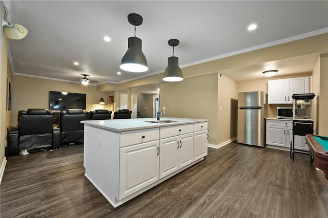 15601 Windsor St, Overland Park, KS 66224 - kitchen featuring stainless steel appliances, a sink, white cabinets, dark wood-type flooring, and ornamental molding