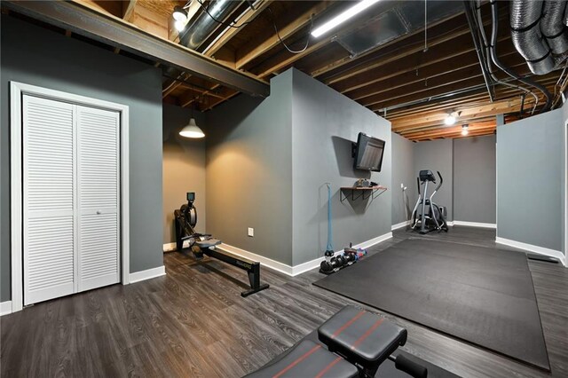 15601 Windsor St, Overland Park, KS 66224 - exercise area featuring wood finished floors and baseboards