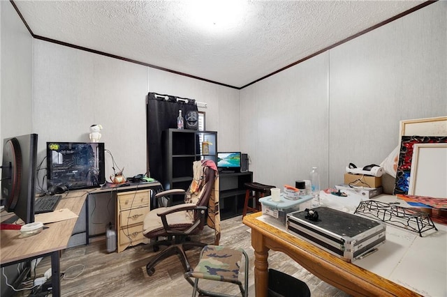 156357 NE Robindale Ln, Adrian, MO 64720 - home office featuring ornamental molding, wood finished floors, and a textured ceiling