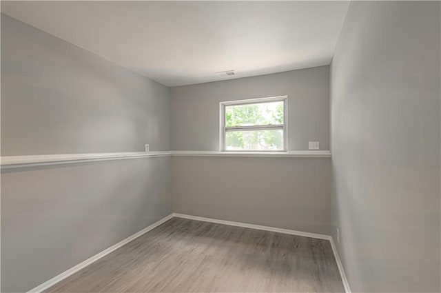 9406 Switzer St, Overland Park, KS 66214 - spare room with baseboards and wood finished floors