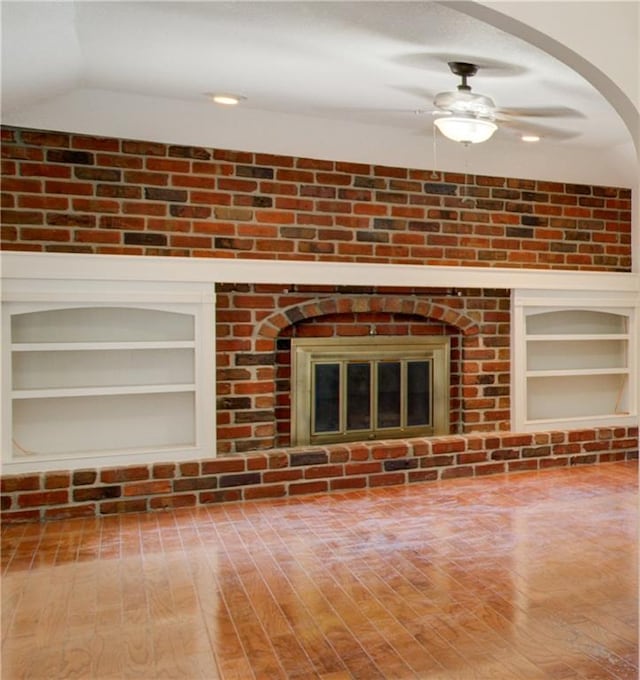 1014 SW Twilight Ln, Blue Springs, MO 64015 - detailed view of wood finished floors, a ceiling fan, and built in features