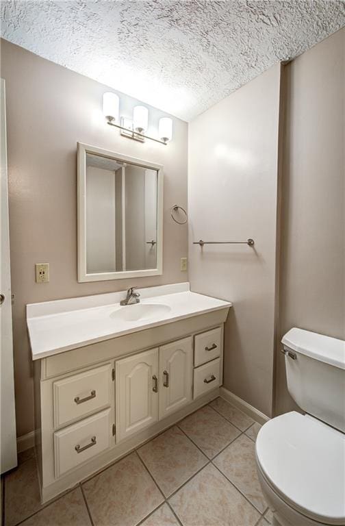 1014 SW Twilight Ln, Blue Springs, MO 64015 - bathroom with vanity, tile patterned flooring, and a textured ceiling