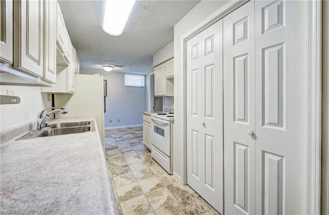 1014 SW Twilight Ln, Blue Springs, MO 64015 - kitchen with white range with electric cooktop, a textured ceiling, light countertops, and white cabinets